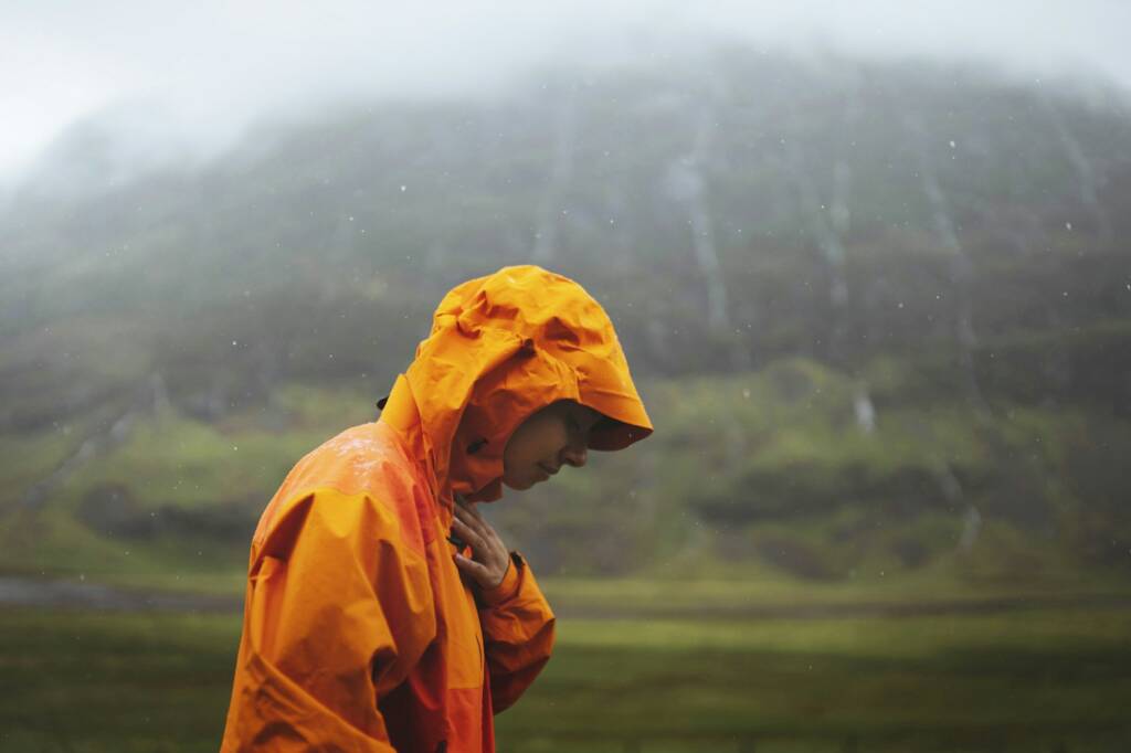 Orange raincoat in the rain